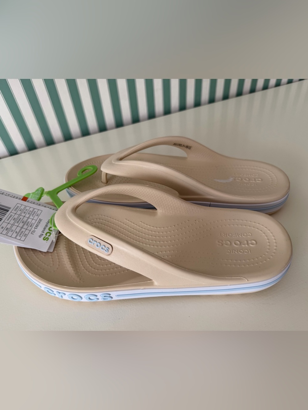 CROCS Women’s Beige and White Flip Flop Sandals